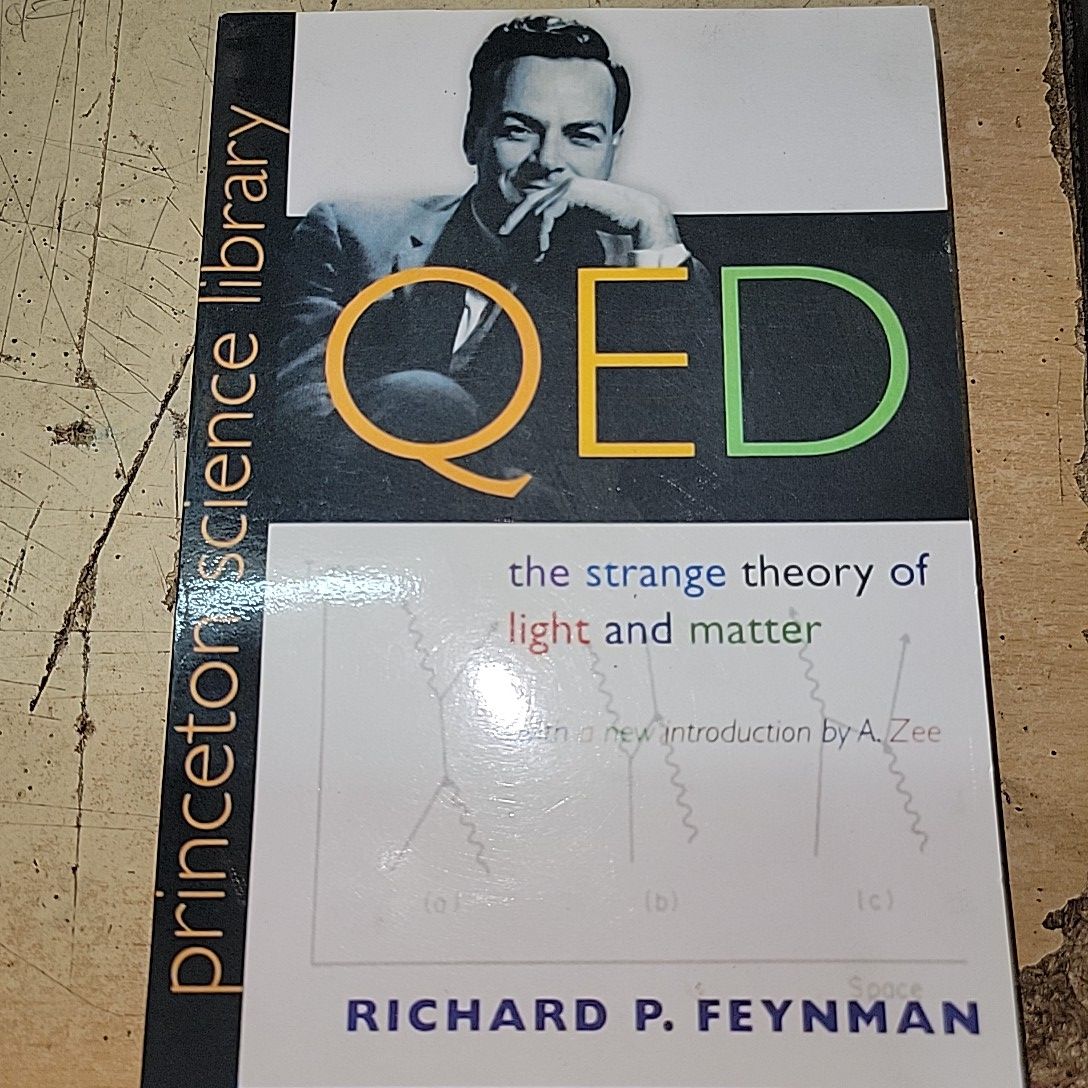Q E D The Strange Theory of Light and Matter