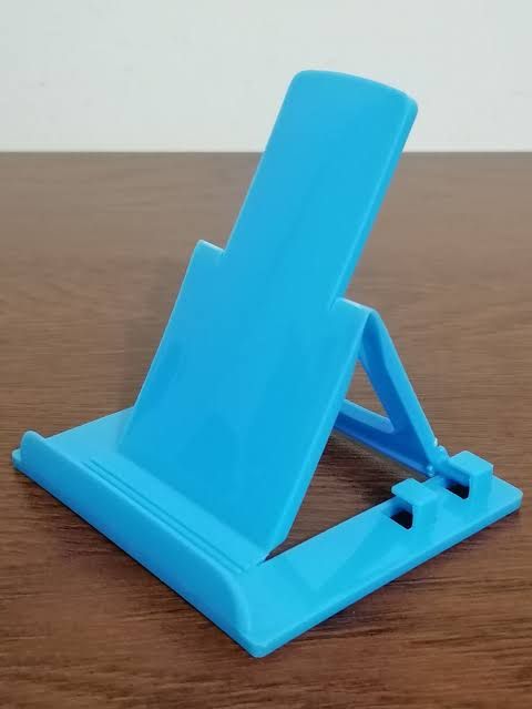 Smart Mobile Holding Mobile top Stand, 180° Perfect View, Height Adjustment, Wide Compatibility, Multipurpose, Anti-Skid Design Twistand  Multiple Colour. 