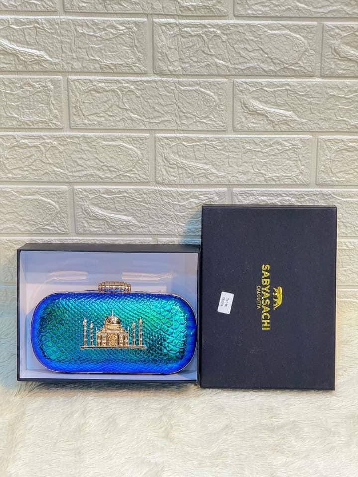 Plain Sabyasachi Clutch. 