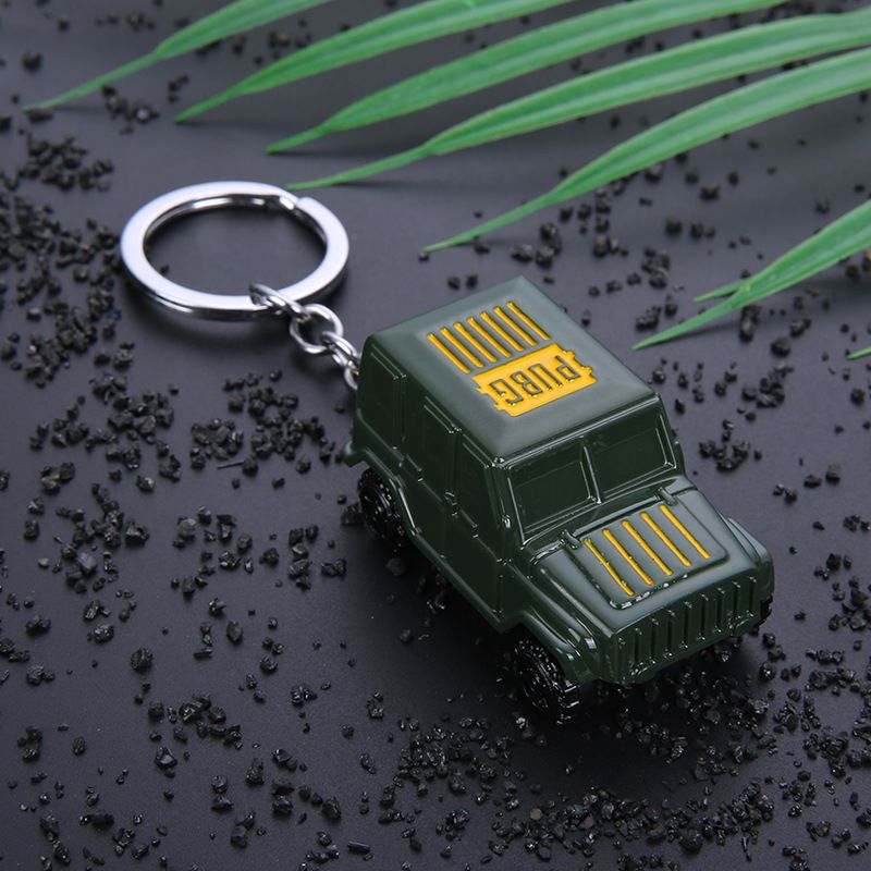 Key chain PUBG helmet pan weapon model pendant peripheral street stall key chain small gifts. 