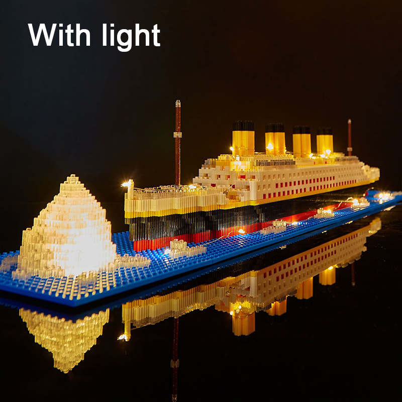 Titanic ship model children's toys birthday gift assembly building block plastic block with lamp toy Titanic building block toy. 