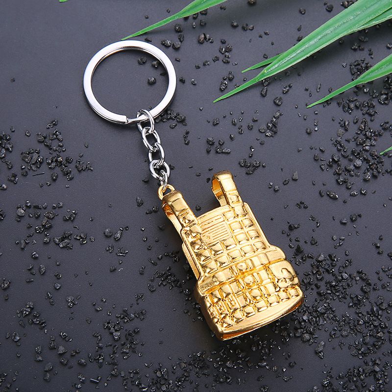 Key chain PUBG helmet pan weapon model pendant peripheral street stall key chain small gifts. 