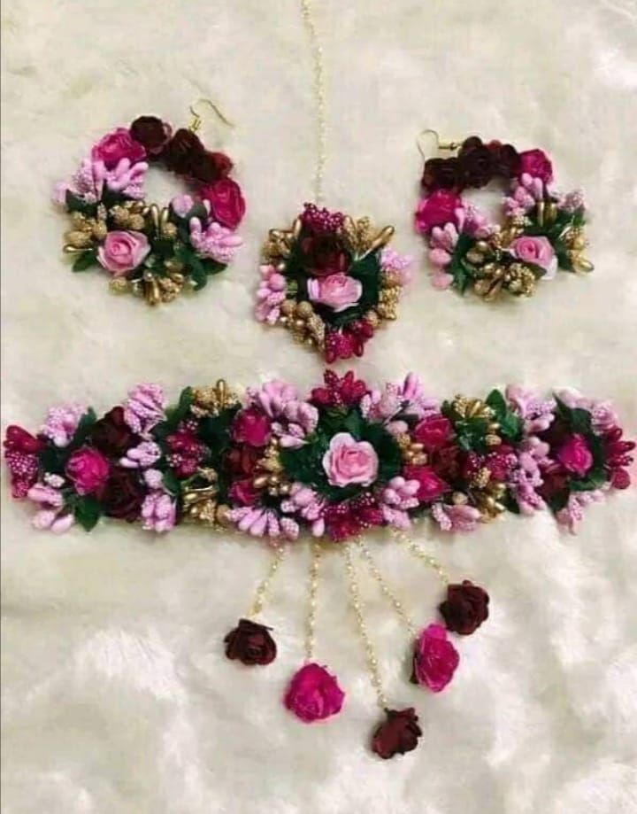 Deep pink, golden & light pink color beautiful garland made of beautiful flower for women