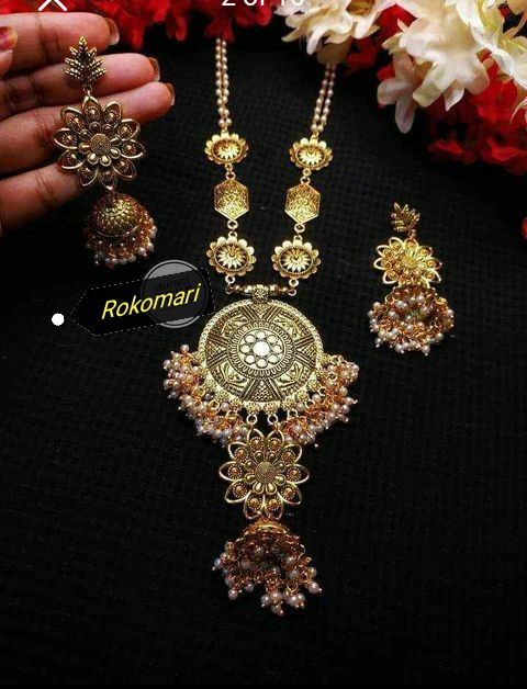 Gorgeous party wear antique golden pendant long necklace set for girls and women.