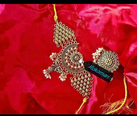 Gorgeous party wear antique golden choker set for girls and women.