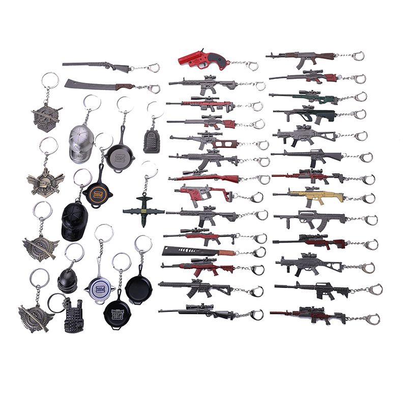 Key chain PUBG helmet pan weapon model pendant peripheral street stall key chain small gifts. 