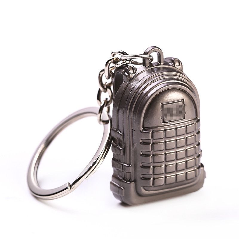 Key chain PUBG helmet pan weapon model pendant peripheral street stall key chain small gifts. 