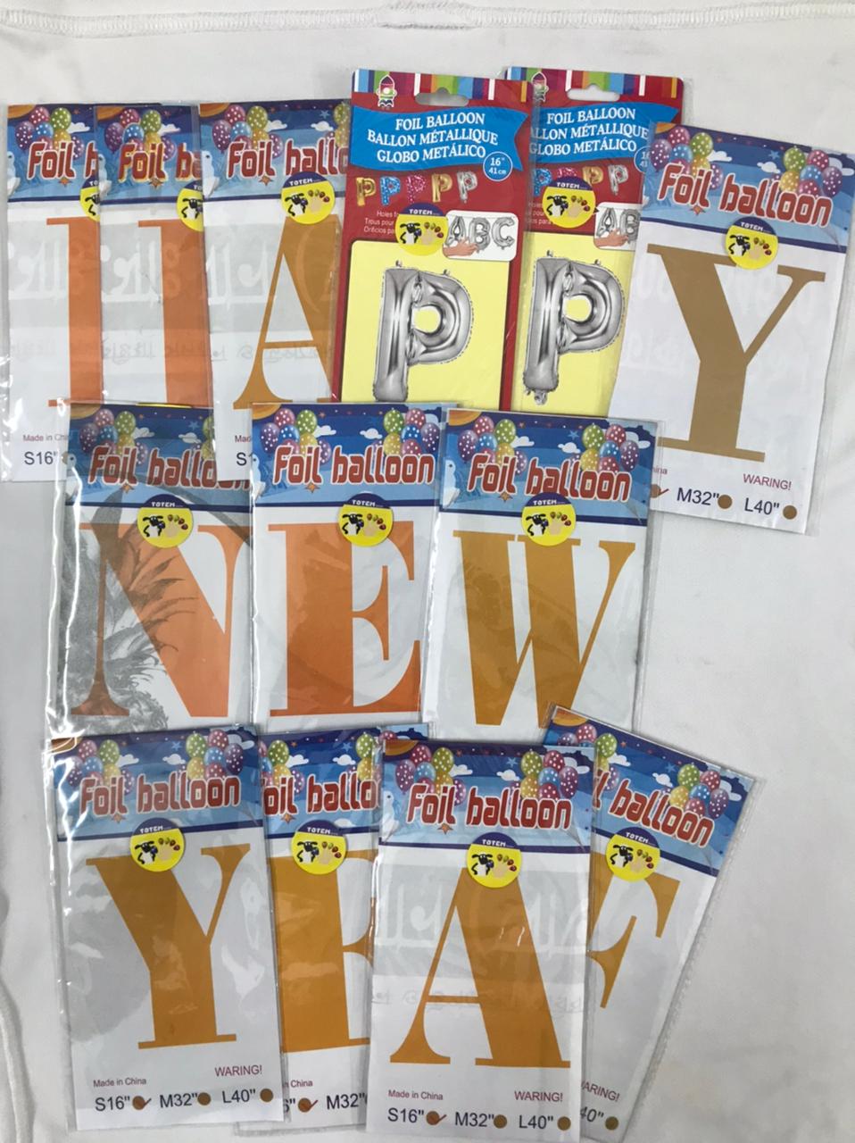 TOTEM happy New year Foil Balloons and number.