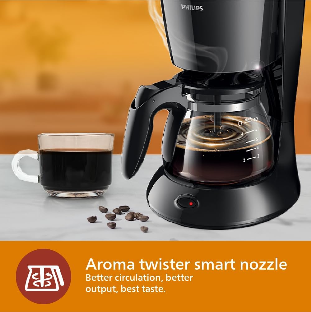 Philips coffee maker HD7432/20 with glass jug makes 2-7 cups in 10 min brewing time, compact design that takes little space in your kitchen, water level indicator. 