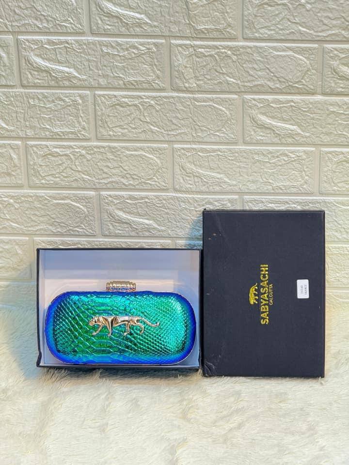 Plain Sabyasachi Clutch. 