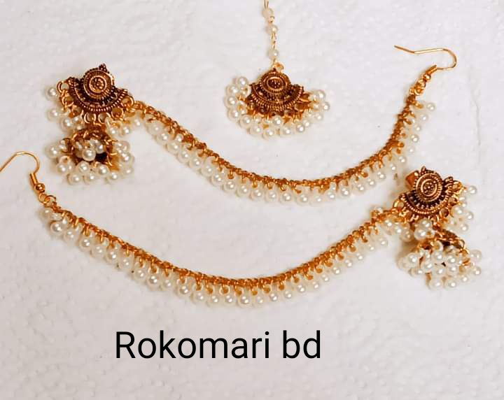 Gorgeous party wear antique golden earrings and tikliset for girls and women.