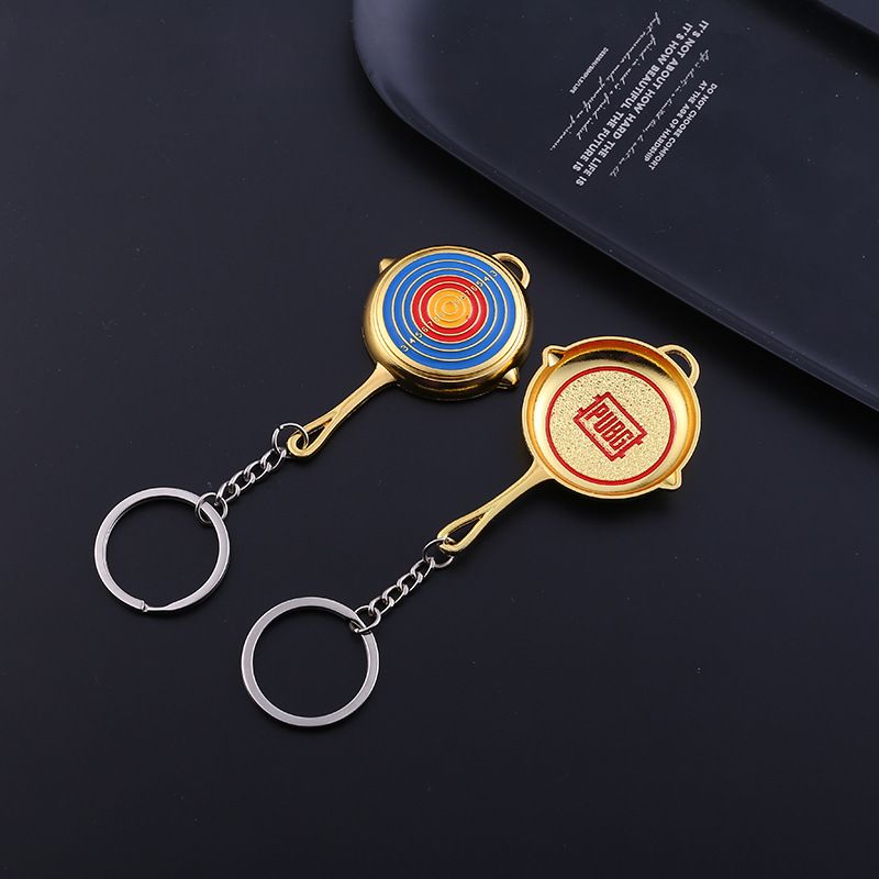 Key chain PUBG helmet pan weapon model pendant peripheral street stall key chain small gifts. 