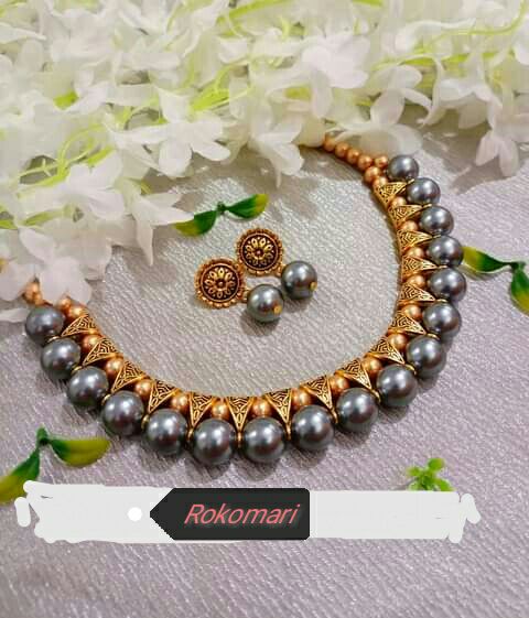 Gorgeous party wear antique golden choker perl beads set for girls and women.