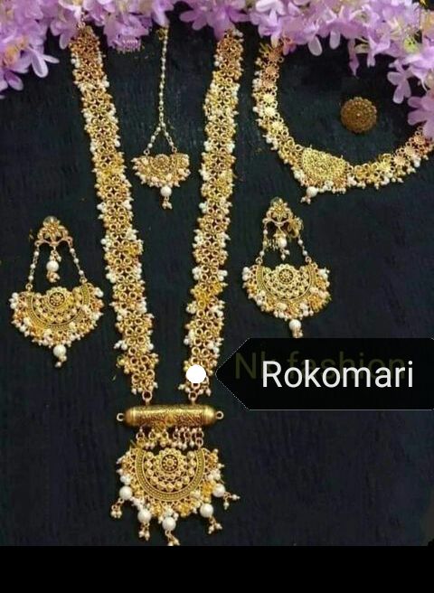 Gorgeous party wear antique golden pendant long chain set for girls and women.