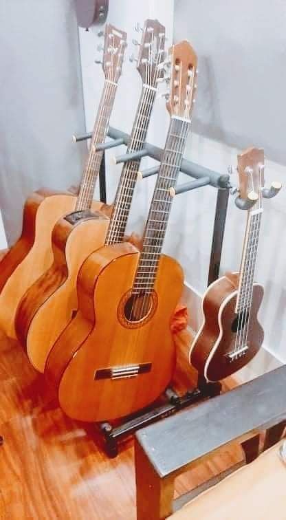 Multiple guitar stand rack with attachable ukulele hanger(4 capacity). 